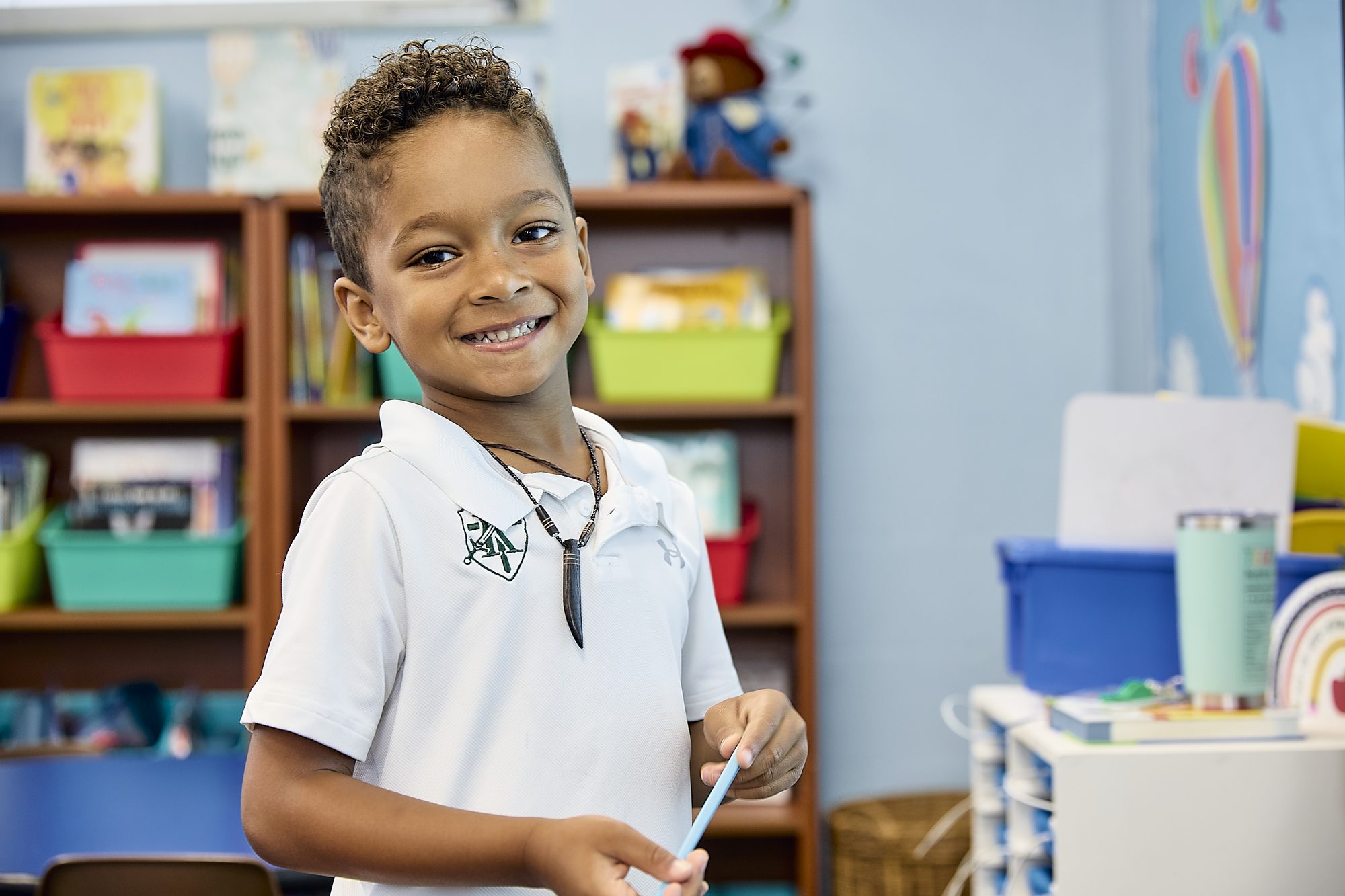 02-admissions-k5-keswick-elementary-boy-smiling Smiling Keswick elementary student in his classroom